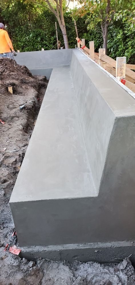Retaining wall construction by Santos Hernandez 84